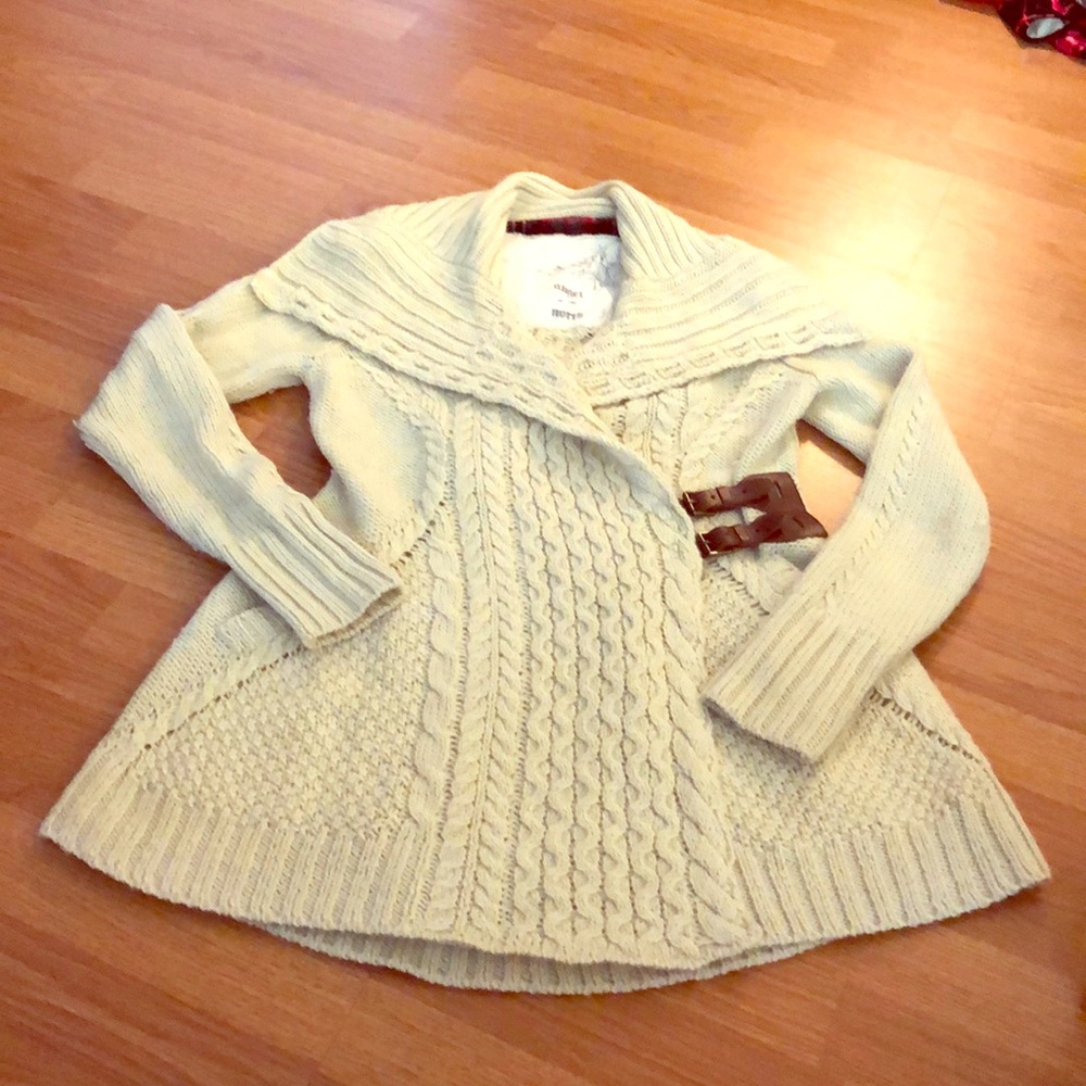 Ivory buckle cable-knit sweater - Anthropologie
